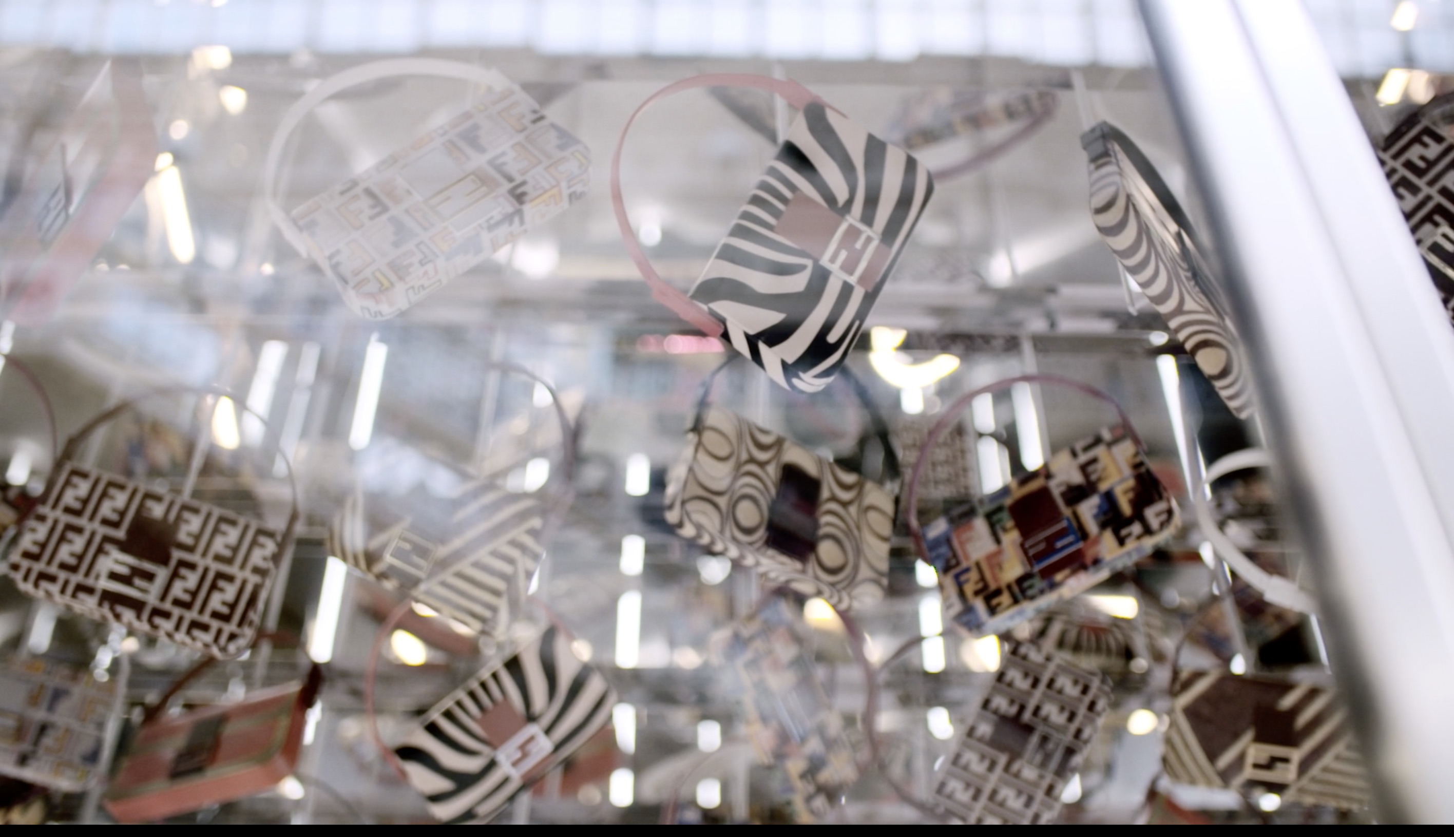 Handbags in Glass Showcase