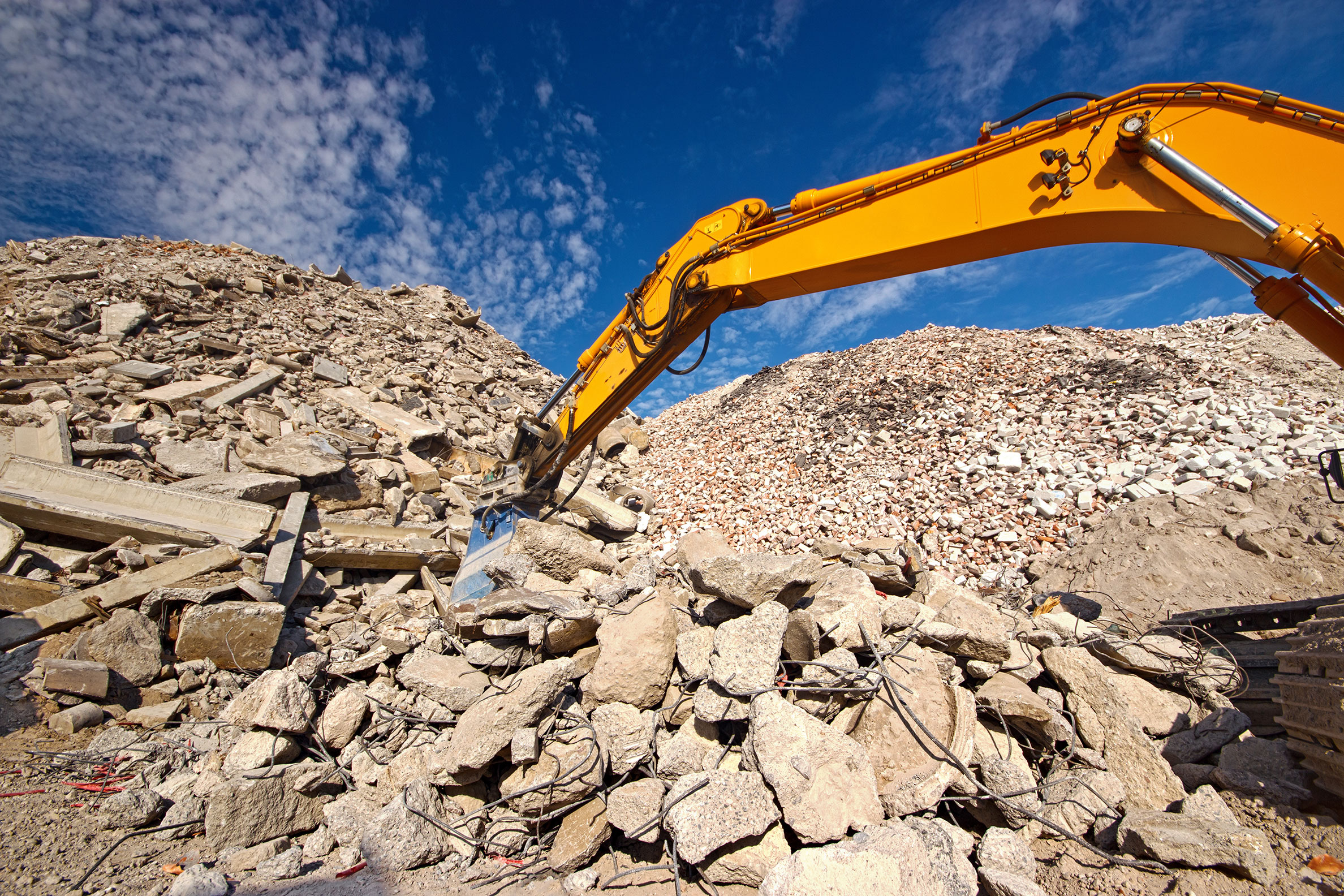 Construction Equipment, Digging Through Rocks